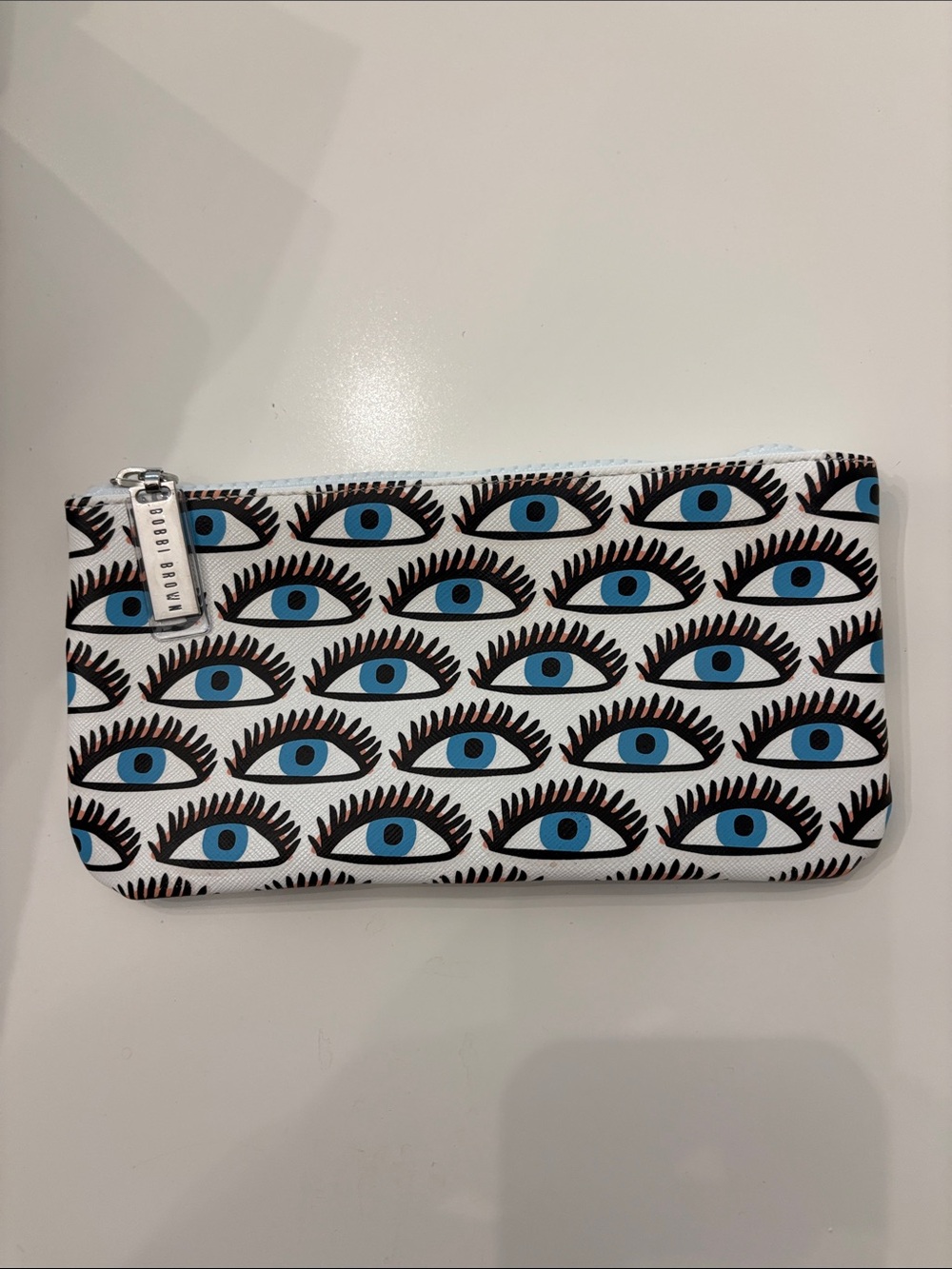Bobbi Brown Blue Eye Print Zip Pouch in White, Black and Blue